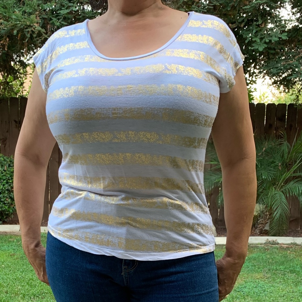Jennifer Lopez gold striped tee